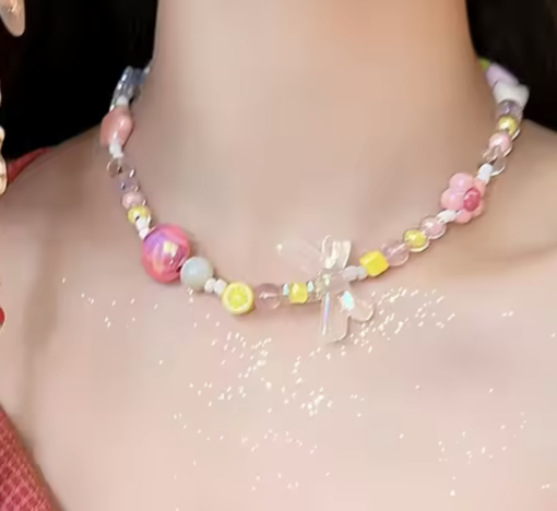 Iridescent Bow and Yellow Bead Blossom Necklace